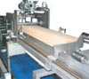 M�quina de encajado autom�tico para caja americana.